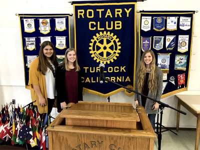 blomenkamp and friends sharing Prem-maa at rotary club